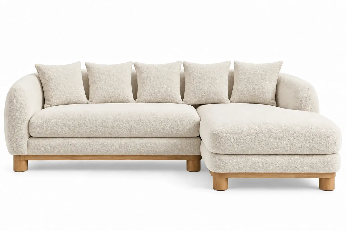 Sofá esquinero tapizado de contorno redondeado, beige y marrón
